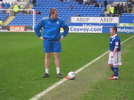 Joel Hutton CEP Coordinator at Cardiff City giving Connah some pointers